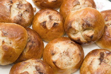 Freshly baked sweet buns, sugar coated.
