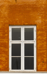 Window on the colorful facade
