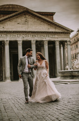 Young wedding couple by Pantheon in Rome, Italy