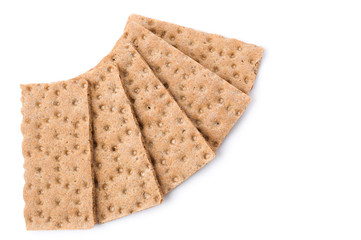 Slices of crunchy crispbread isolated on white background.