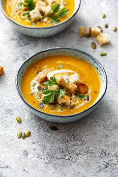 Spicy pumpkin soup with croutons.