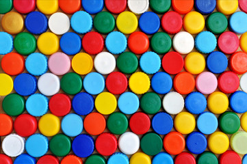 Abstract colored background of plastic caps