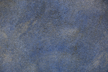 Texture of the blue plaster on the wall