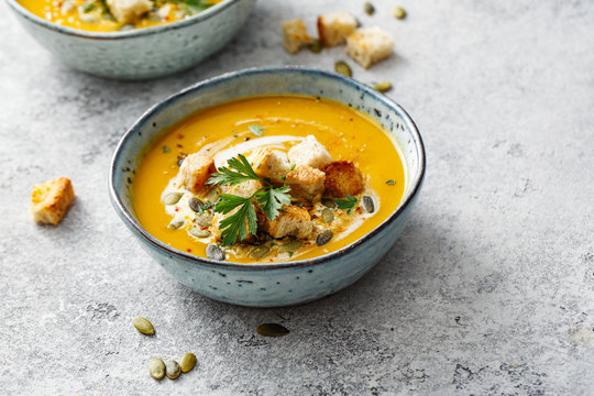 Spicy pumpkin soup with croutons.