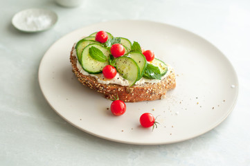 A Mediterranean twist on bruschetta with cream cheese, mint, cucumber and mini tomatoes.