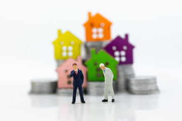 Fototapeta premium Miniature people: Businessman meeting guaranteed loan, third party, guarantor. Image use for business concept.