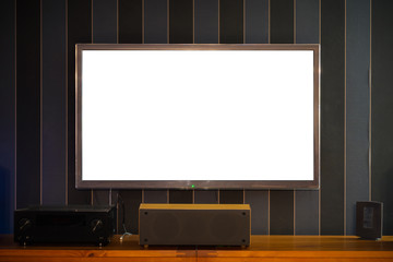 White clipping path blank empty big large flat TV screen with copy space hanging on a living room interior wall. Advertisment concept mockup.