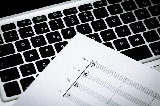 Music paper with laptop