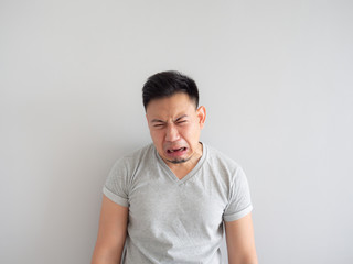 Obraz premium Funny face of man denying something.e donuts and puff pie.