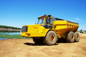 yellow Dumper industrial truck