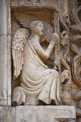 Italy, Puglia region, Altamura,  Cathedral of Santa Maria Assunta, gate and sculptures of the main façade.