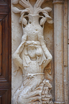 Italy, Puglia region, Altamura,  Cathedral of Santa Maria Assunta, gate and sculptures of the main façade.