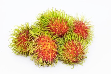 Healthy fruit, rambutan red green sweet delicious fresh fruit combination isolated on white background. 