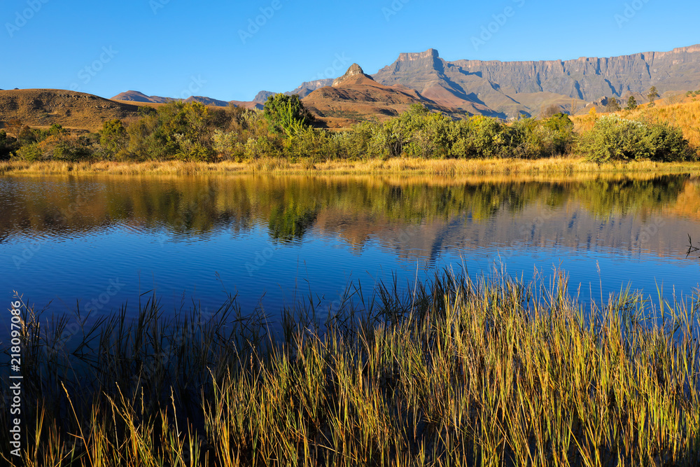 Sticker Drakensberg mountains with reflection in water, Royal Natal National Park, South Africa.