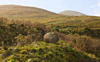 Landscape with a round stone in the Mourne Mountains, near Newcastle, Northern Ireland. Landscape,...