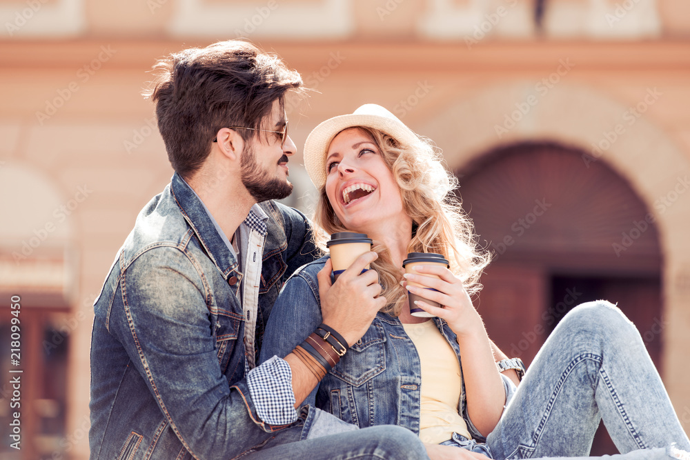 Canvas Prints Young couple drink coffee to go and having fun