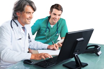 Portrait of Two Doctors Looking at a Computer Monitor