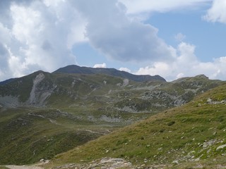 summit rock panorama landscape of the high mountains in south tyrol italy europe with clouds