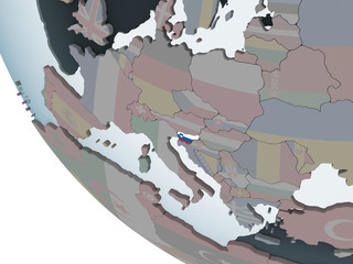 Slovenia with flag on globe