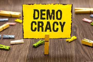 Text sign showing Demo Cracy. Conceptual photo freedom of the people to express their feelings and...