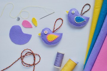 Hand made decoration. Little bird from felt fabric, tutorials how to make felt ornaments.