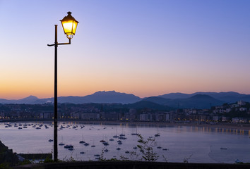 Sunrise in the bay of La Concha in the city of San Sebastian, Basque Country