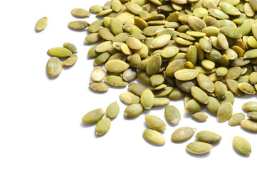 Peeled pumpkin seeds isolated on white