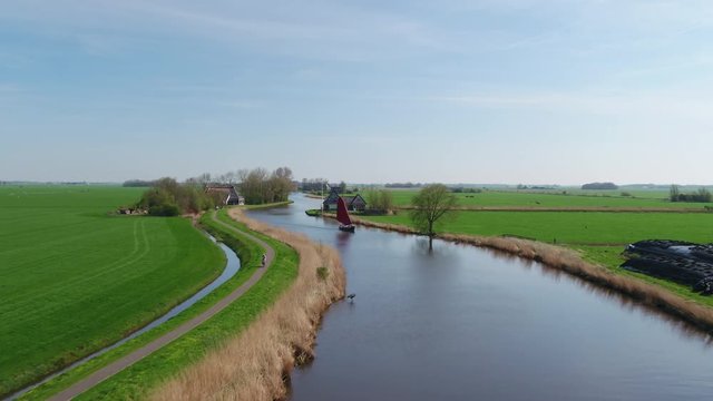 Dutch Sailboats on rivers in the Netherlands on the countryside shot with Inspire 2 drone
