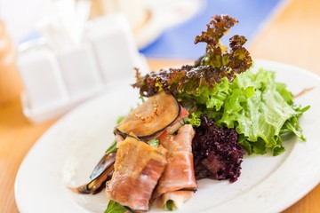 Closeup of a Salad with Ham and Aubergines
