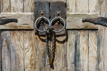 Old door locked in Key West harbor, Florida, USA.