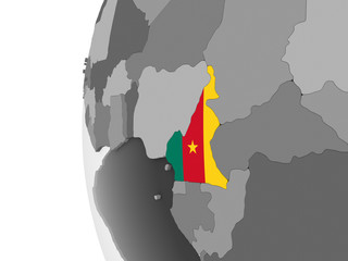 Cameroon with flag on globe