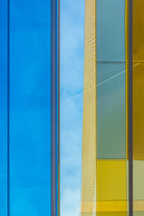 Contrasting colors and reflections on a building facade in Manchester, UK