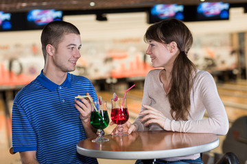 woman and man together in bowling club