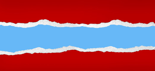 Ripped red paper on blue background