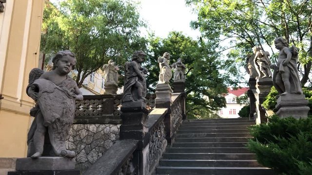 Baroque architecture with little cherubs, cupids and angles at Loreta in Prague