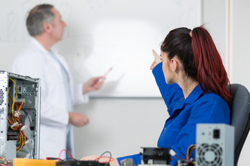 Fototapeta premium girl student studying electronic device with a microprocessor