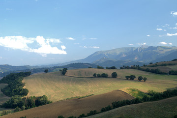 italy,panorama,landscape,mountain,hill,countryside,field,view,sky,horizon