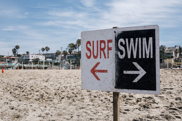 Surf and Swim sign at the beach