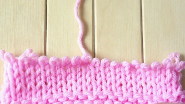 Frogging ripping the knitting learned from a YouTube video online.