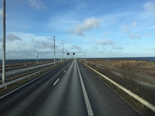Fototapeta premium The Oresund bridge between Denmark and Sweden. Driving from Sweden to Denmark. Bridge on the sea ,architecture landscape in sweden