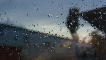 Drops of water from the rain on the car glass