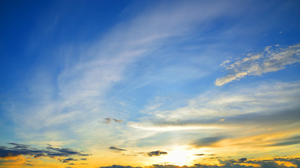 Fluffy white cloud on blue sky before sunset in the evening.