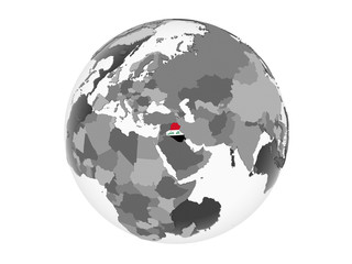 Iraq with flag on globe isolated