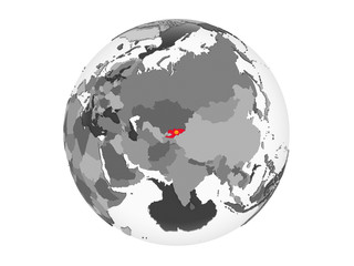 Kyrgyzstan with flag on globe isolated