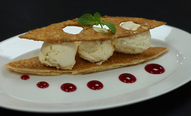 vanilla ice cream, crispy tuile, raspberry sauce