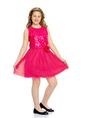 Elegant girl in a dress.