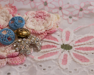 Pink roses and vintage buttons background