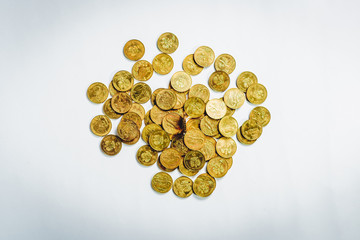 Top view on Polish Golden coins stacks on bright light glowing bokeh background, business finance wealth and success concept
