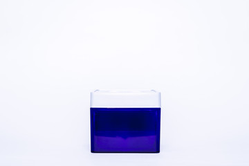 Single blue, dark box with a plug. Container on a white background with an empty place to fill in the form of a mock-up.