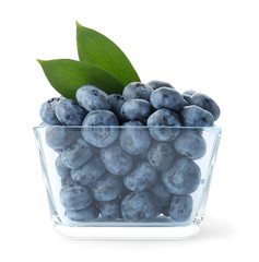 Bowl full of fresh ripe blueberries on white background
